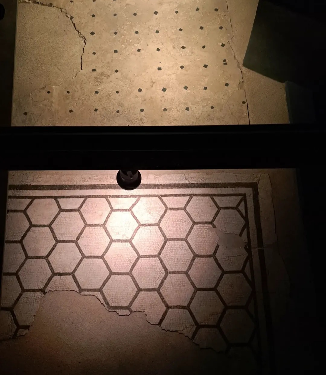 Roman archaeological remains inside the Archaeological Box at Piazza Albania